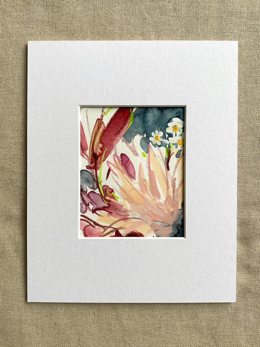 Floral watercolor painting in a white mat on a textured beige background