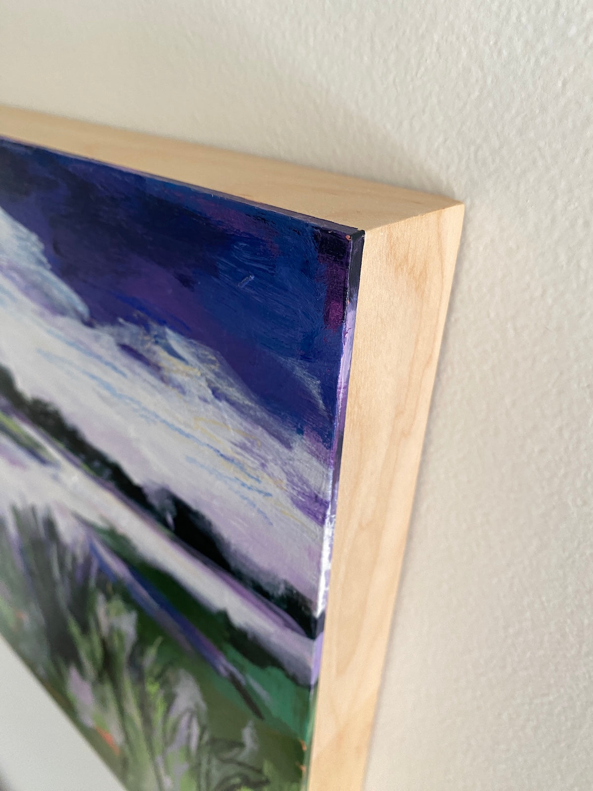 Close-up corner view of landscape painting